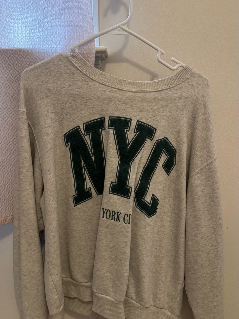 Hollister Cream Crewneck Sweatshirt with Dark Green NYC Appliqué